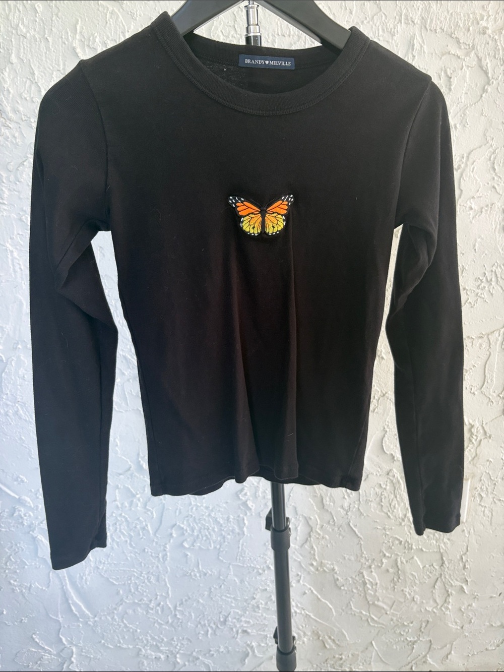 Brandy Melville Black Long-Sleeve Tee with Orange Butterfly Patch